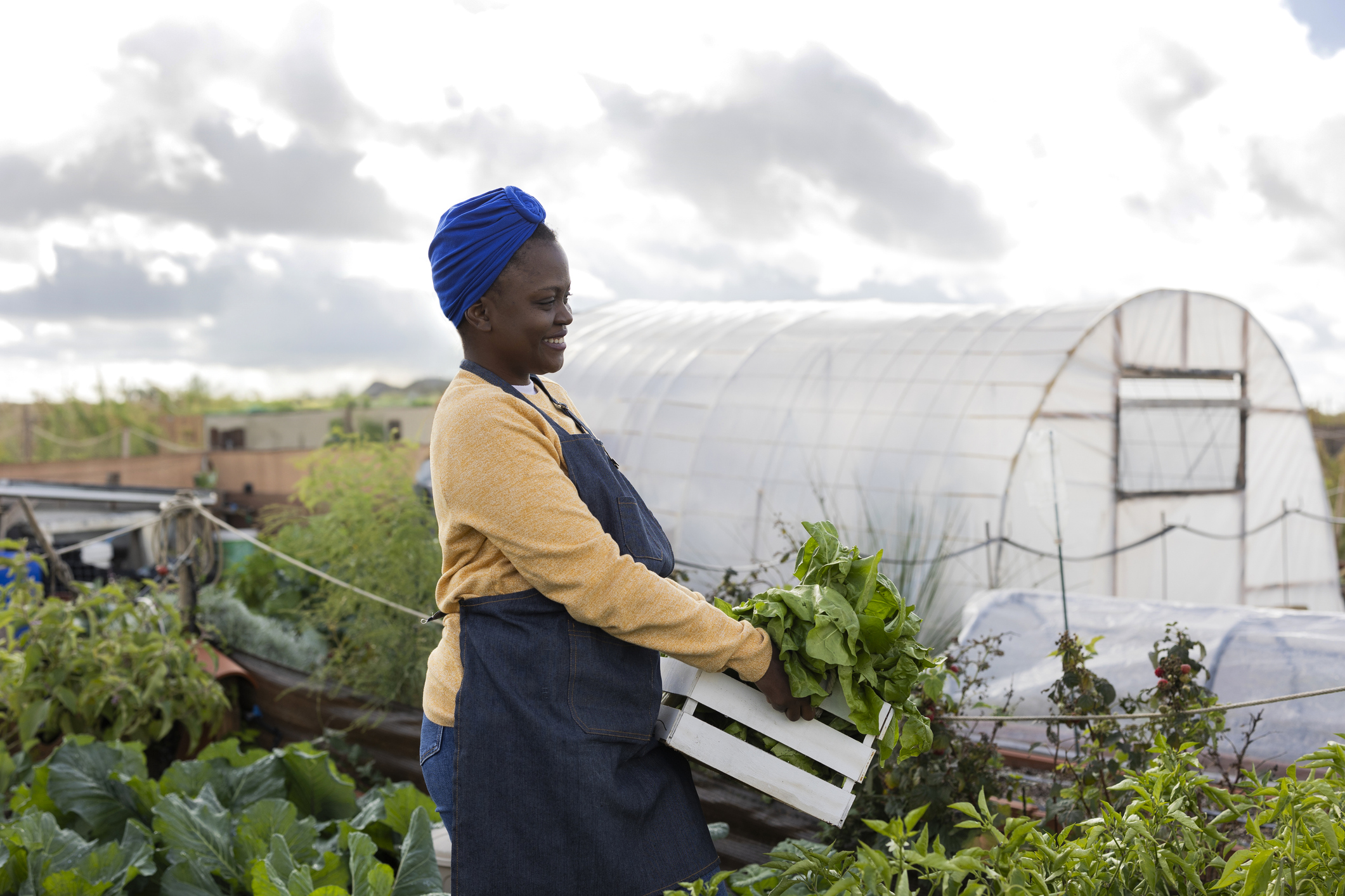 Woman working happily in farm